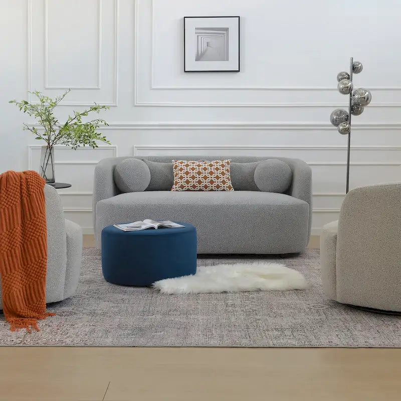 Canapé 2 places KINWELL en tissu bouclé avec coussins