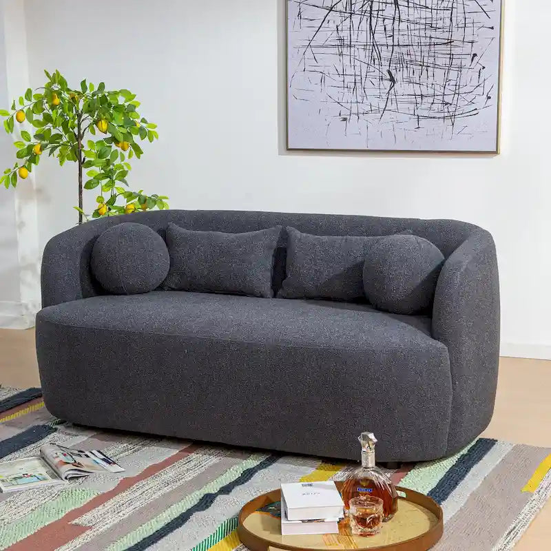 Canapé 2 places KINWELL en tissu bouclé avec coussins