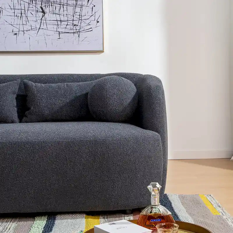 Canapé 2 places KINWELL en tissu bouclé avec coussins