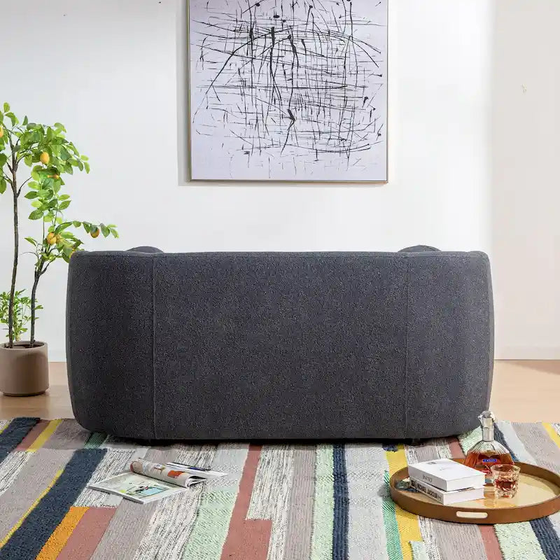 Canapé 2 places KINWELL en tissu bouclé avec coussins