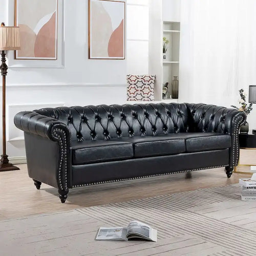 Canapé Chesterfield capitonné en similicuir avec accoudoirs roulés (84,65)