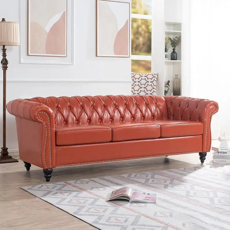 Canapé Chesterfield capitonné en similicuir avec accoudoirs roulés (84,65)