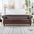 Canapé Chesterfield capitonné en similicuir avec accoudoirs roulés (84,65)