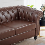 Canapé Chesterfield capitonné en similicuir avec accoudoirs roulés (84,65)