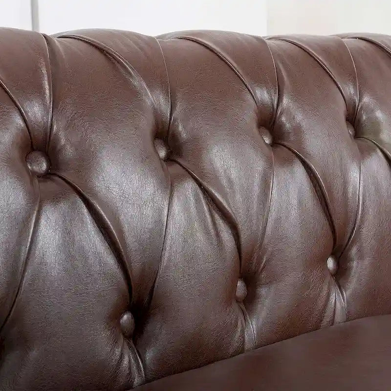 Canapé Chesterfield capitonné en similicuir avec accoudoirs roulés (84,65)