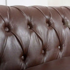 Canapé Chesterfield capitonné en similicuir avec accoudoirs roulés (84,65)