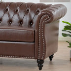 Canapé Chesterfield capitonné en similicuir avec accoudoirs roulés (84,65)