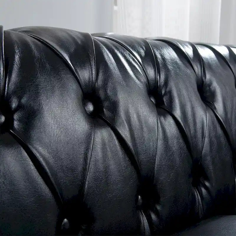 Canapé Chesterfield capitonné en similicuir avec accoudoirs roulés (84,65)