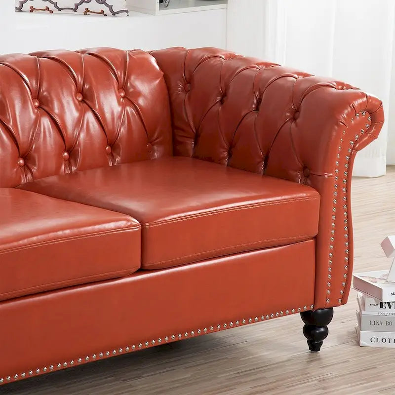 Canapé Chesterfield capitonné en similicuir avec accoudoirs roulés (84,65)