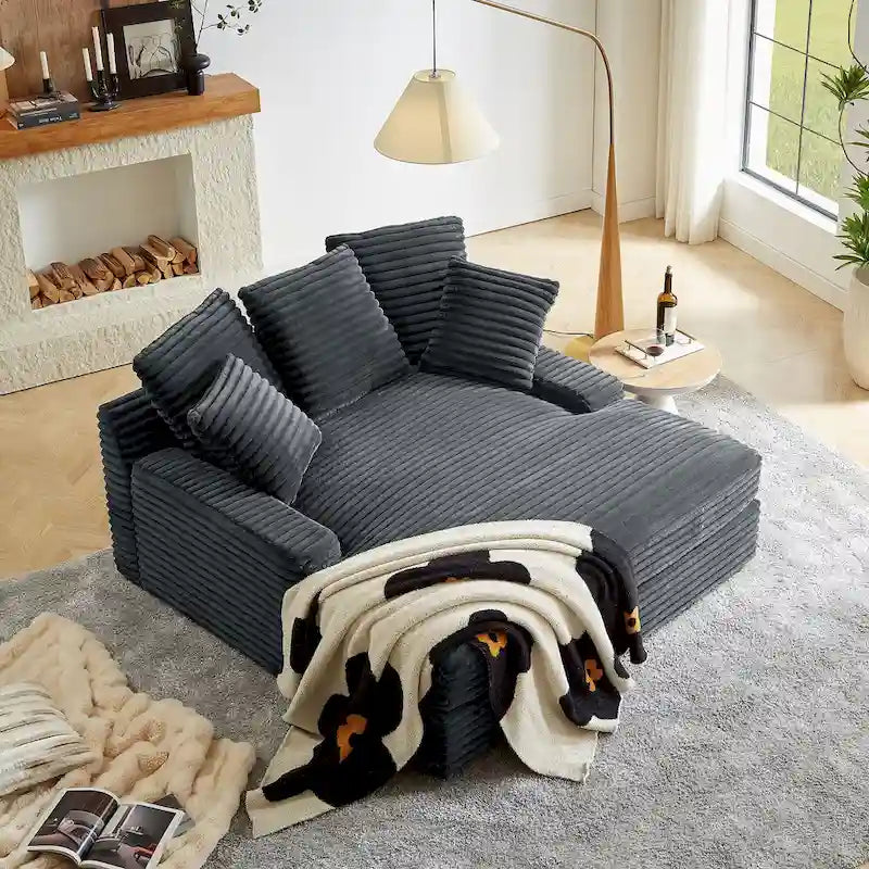 Canapé-lit double moderne, confortable et moelleux, revêtu de velours côtelé doux et moelleux.