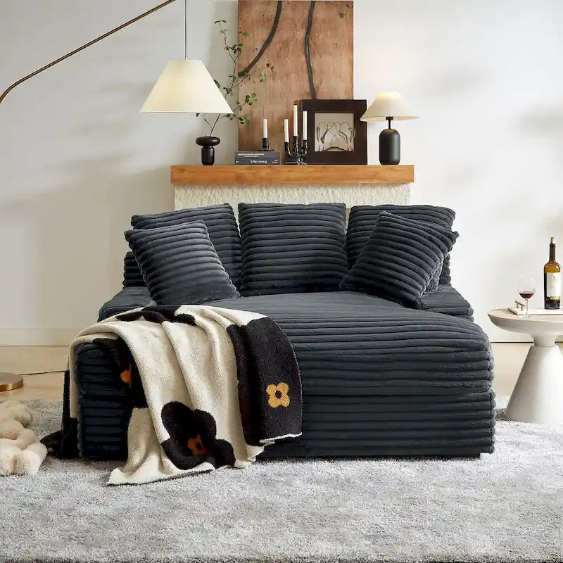 Canapé-lit double moderne, confortable et moelleux, revêtu de velours côtelé doux et moelleux.