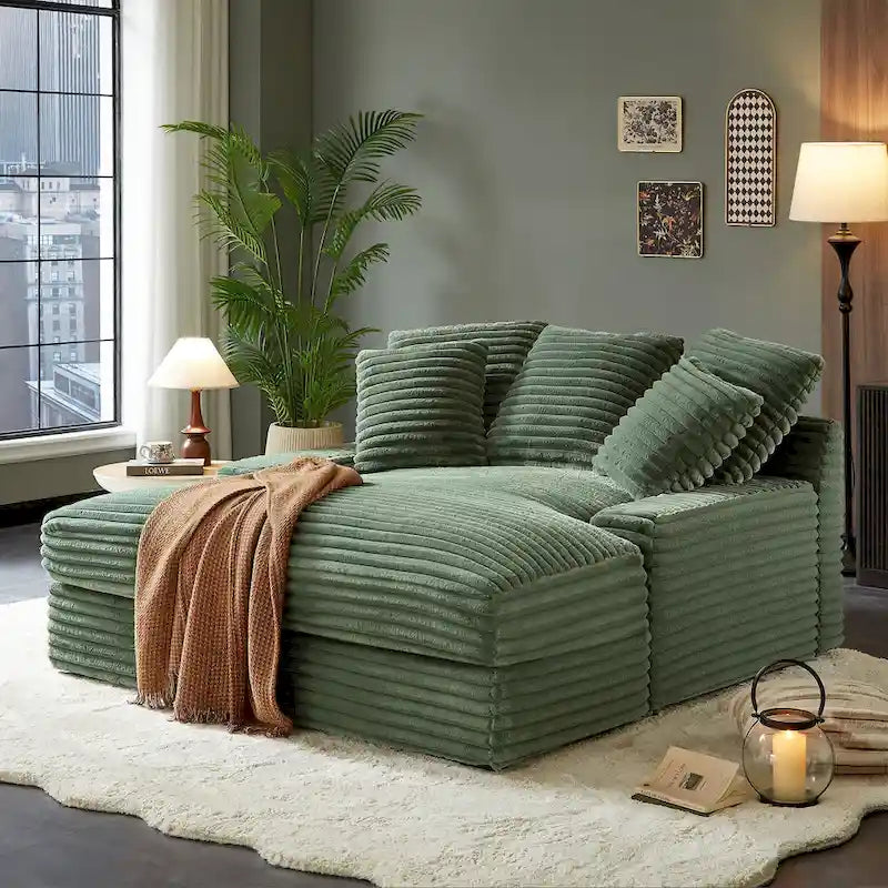 Canapé-lit double moderne, confortable et moelleux, revêtu de velours côtelé doux et moelleux.