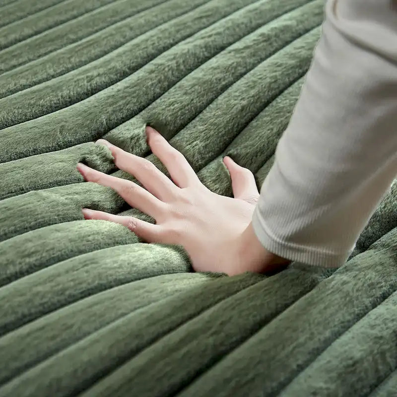Canapé-lit double moderne, confortable et moelleux, revêtu de velours côtelé doux et moelleux.